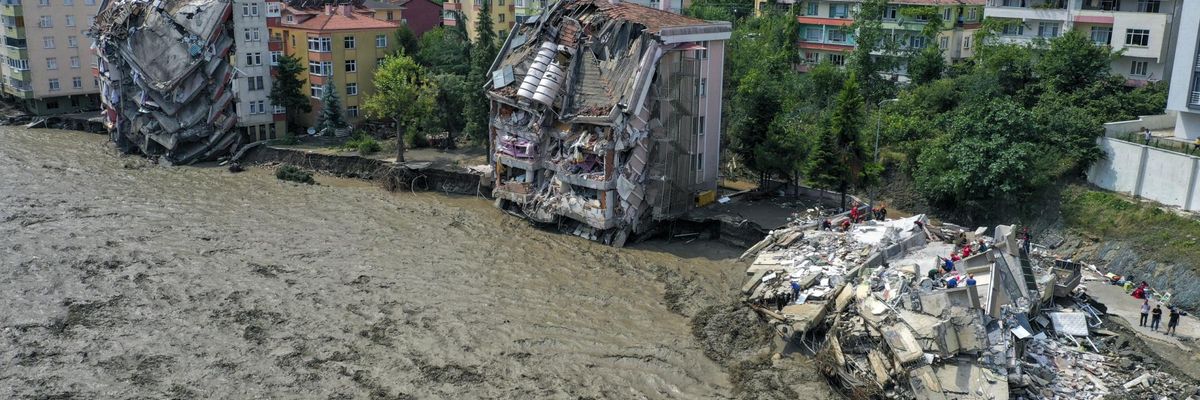 A drone photo shows ongoing rescue operations after heavy rainfall caused flooding that destroyed and damaged apartment buildings in the Bozkurt district of Kastamonu, Turkey on August 12, 2021. (Photo: Bilal Kahyaoglu/Anadolu Agency via Getty Images)