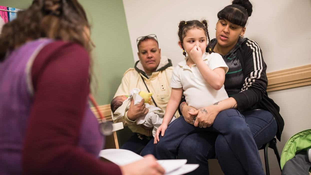 A family goes to the pediatrician.