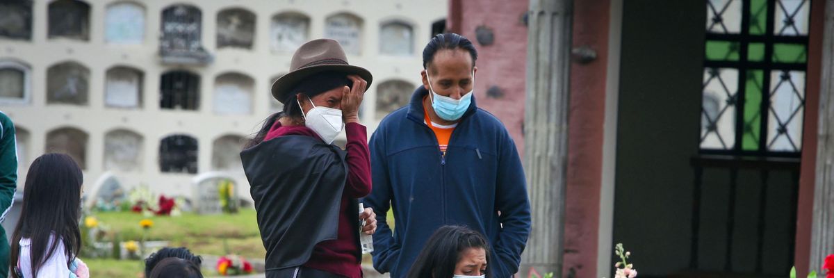 A family mourns a loved on in Ecuador