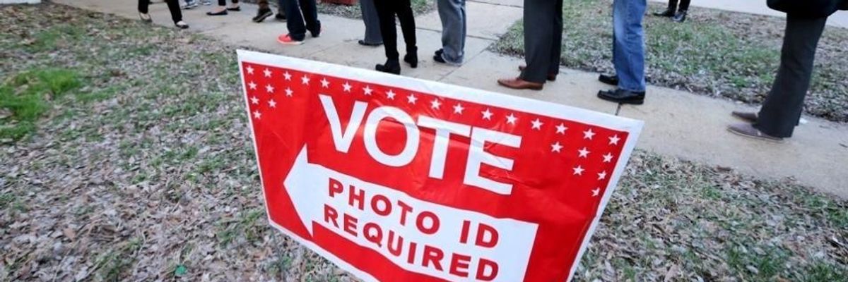 Federal Judge Blocks NC's Voter ID Law, Citing State's 'Sordid History' of Racist Voter Suppression