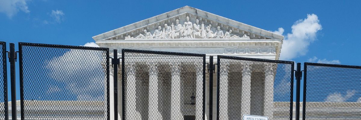 A fence blocks the entrance to the U.S. Supreme Court