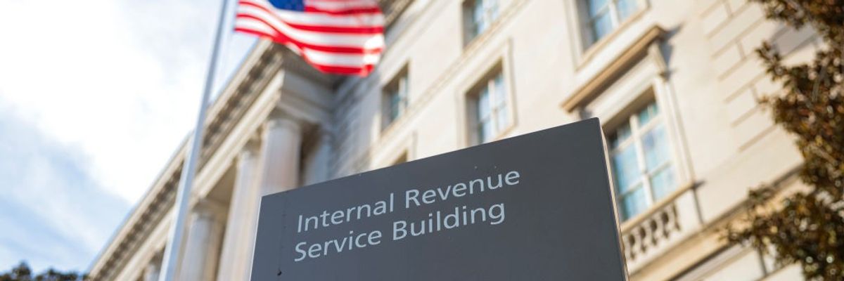 A flag waves above the Internal Revenue Service Headquarters In Washington, D.C.