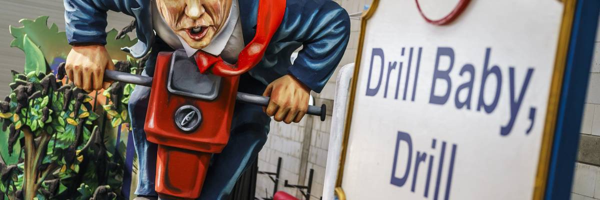 A float of Trump using a drill.