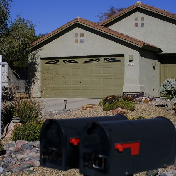 A ''For Sale'' sign is seen outside a residential home