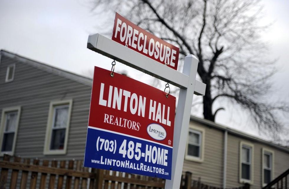 A Foreclosure Sign is Posted in the Front of a House in Alexandria Virginia Usa 17 December 2008 in a Move to Stimulate the Ever-weakening Us Economy Federal Reserve Cut Its Key Rate to a Historic Low Range of 0 to 0 25 Percent the Previous DayUsa Economy Housing - Dec 2008