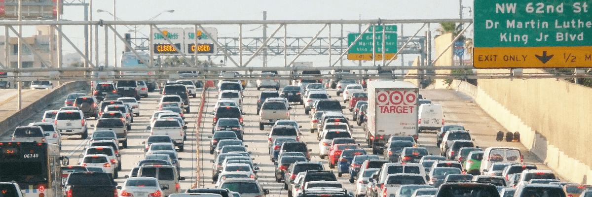 a freeway is clogged with traffic