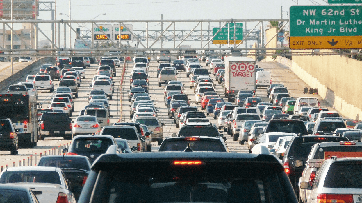 a freeway is clogged with traffic