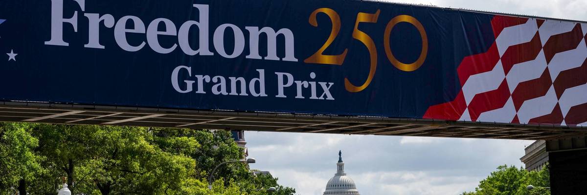 A gantry advertises the Freedom 250 Grand Prix.