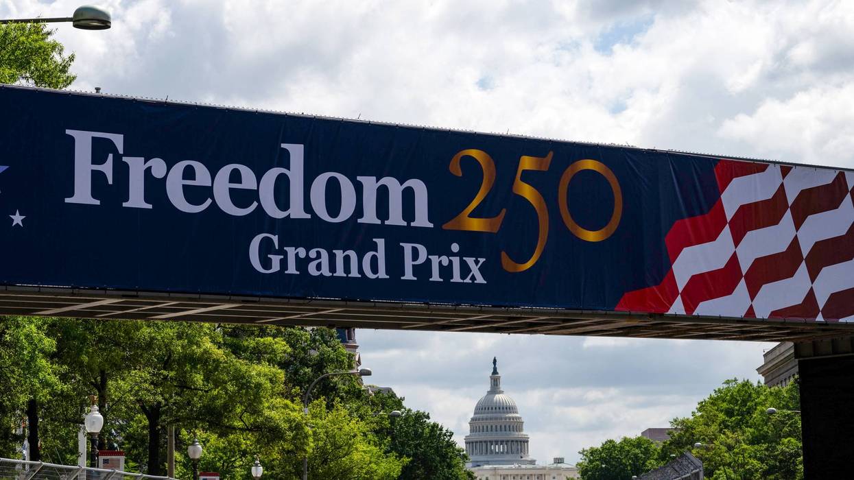 A gantry advertises the Freedom 250 Grand Prix.