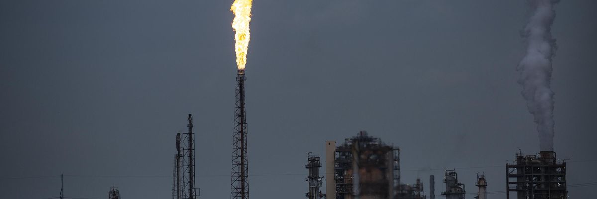 A gas flare from the Shell Chemical LP petroleum refinery illuminates the sky on August 21, 2019 in Norco, Louisiana. (Photo: Drew Angerer/Getty Images)