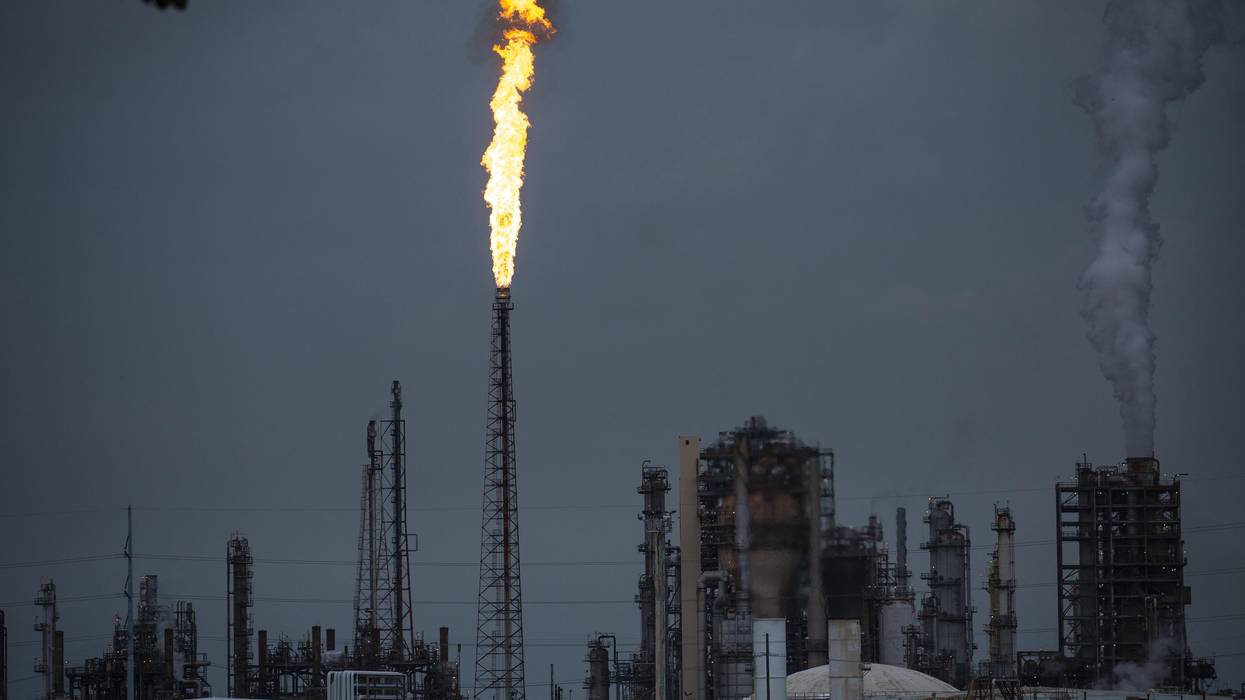 A gas flare from the Shell Chemical LP petroleum refinery illuminates the sky on August 21, 2019 in Norco, Louisiana. (Photo: Drew Angerer/Getty Images)
