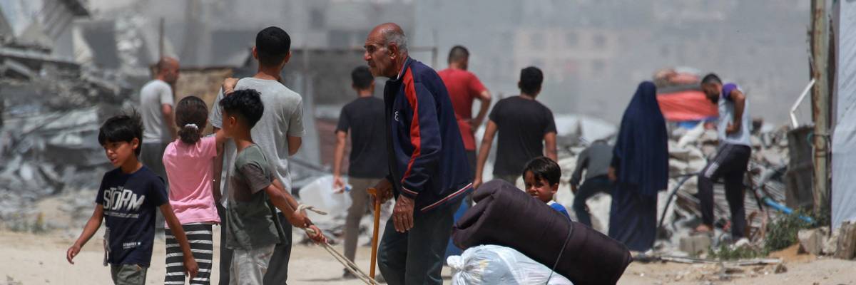 a group of Palestinian children and a Palestinian man.