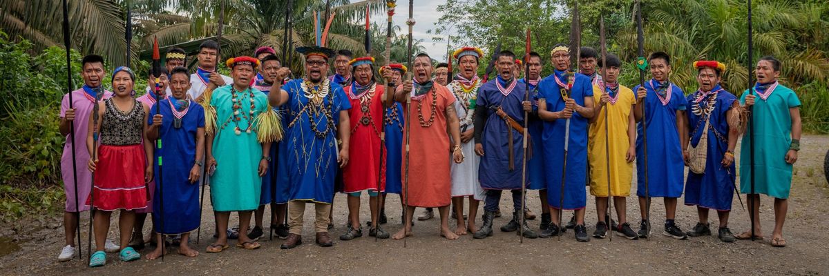 A group of Siekopai people stand together