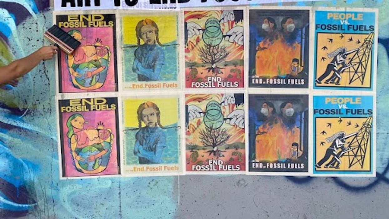 A hand uses a brush to paste colorful posters to a wall under the banner, "Art to End Fossil Fuels."