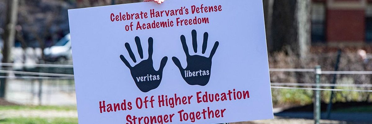 A Harvard faculty member protests Trump's attacks.