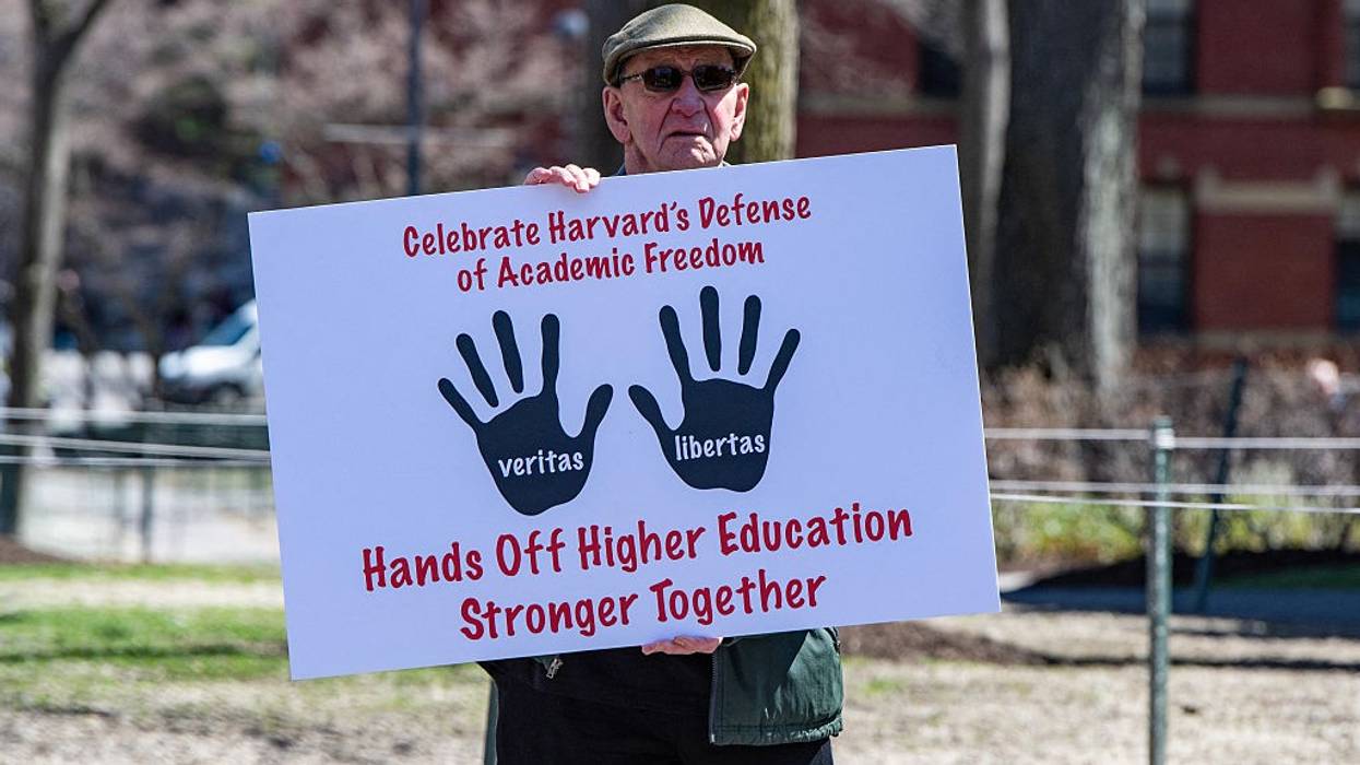 A Harvard faculty member protests Trump's attacks.