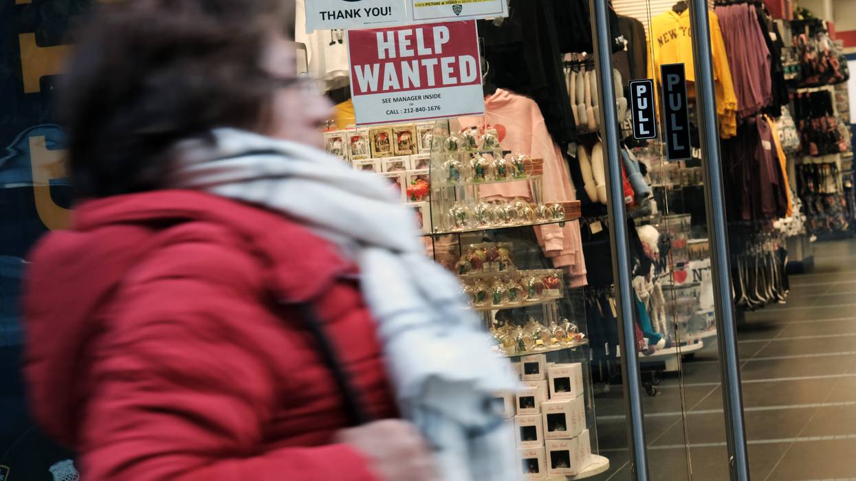 A 'help wanted' sign is displayed in a window