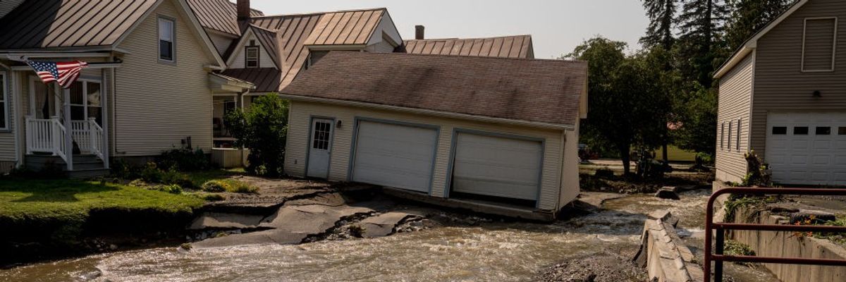 A home knocked off its foundation by flood waters.