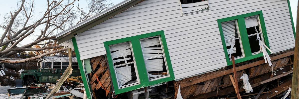 A home ripped off its foundation is seen in Fort Myers Beach, Florida on October 30, 2022, roughly one month after Hurricane Ian made landfall.