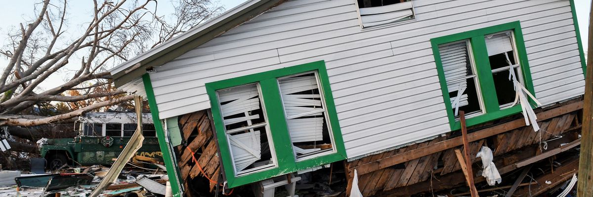 A home ripped off its foundation is seen in Fort Myers Beach, Florida on October 30, 2022, roughly one month after Hurricane Ian made landfall.