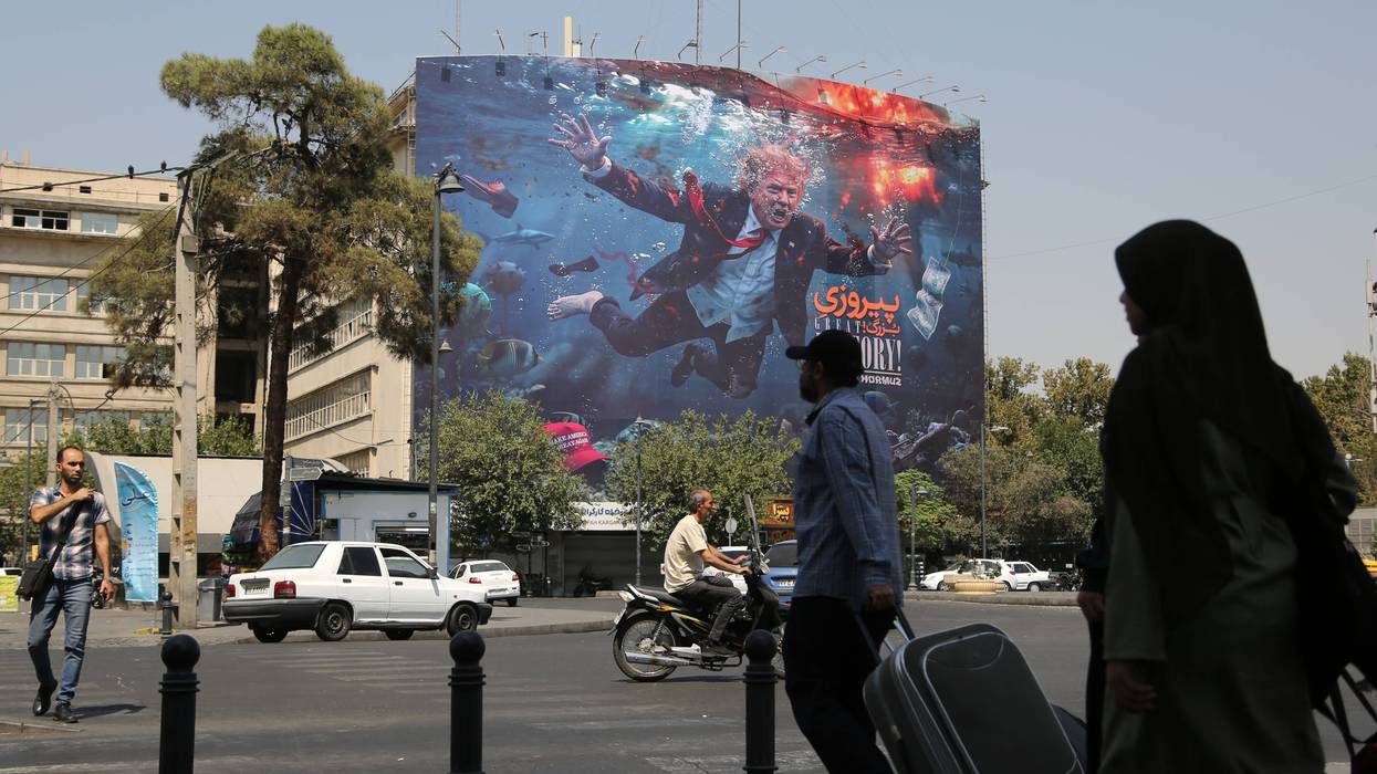 A huge anti-US banner has been hung in Tehran
