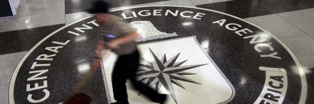 A janitor mops the floor at CIA headquarters