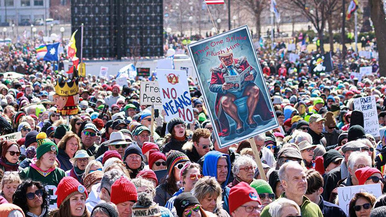 A large crowd of demonstrators gather outside the Minnesota State Capitol