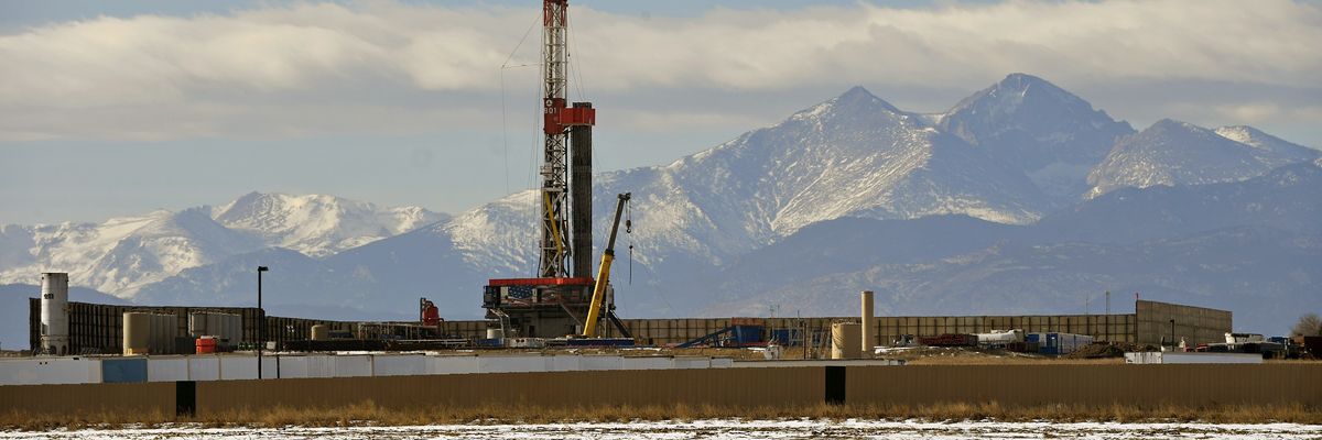 A large fracking operation becomes a new part of the horizon with Mount Meeker and Longs Peak looming in the background on December 28, 2017 in Loveland, Colorado.