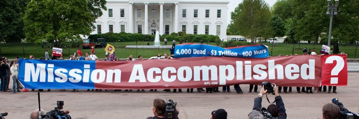 A large replica of the"Mission Accomplished" banner on Pennsylvania Avenue in front of the White House in Washington, DC May 1, 2008