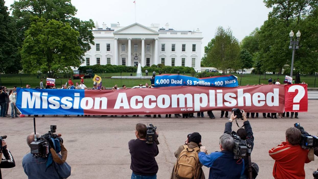 A large replica of the"Mission Accomplished" banner on Pennsylvania Avenue in front of the White House in Washington, DC May 1, 2008