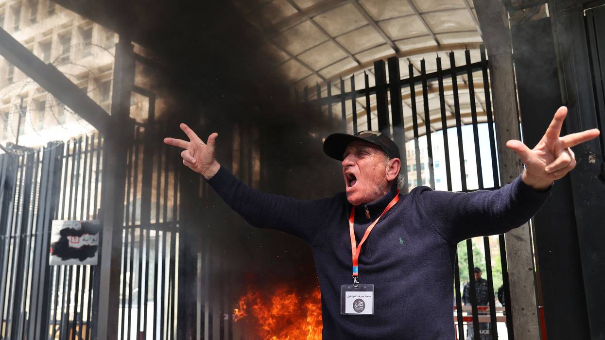 A Lebanese protestor shouts slogans