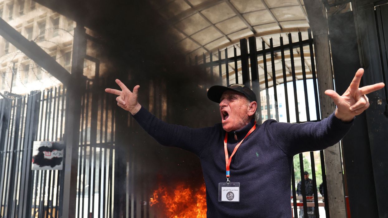 A Lebanese protestor shouts slogans