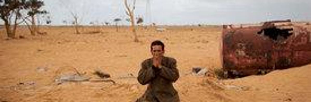 Is Muammar Gaddafi a Target? PM and Military Split Over War Aims