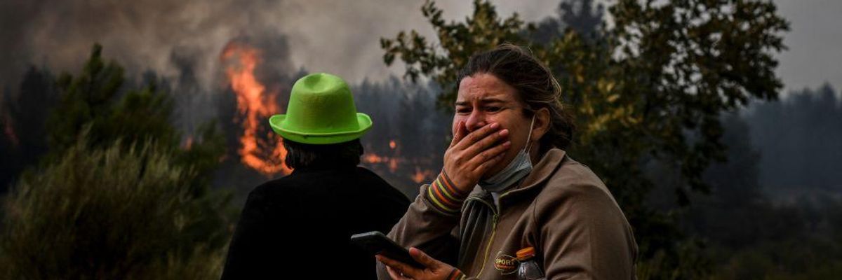 A local reacts to watching a wildfire in Portugal