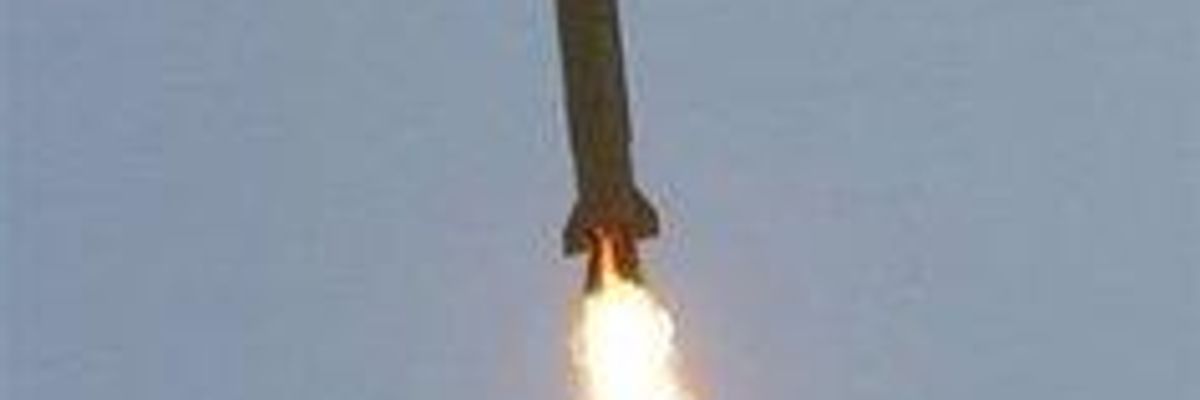 Iran Tests Long-Range Missiles