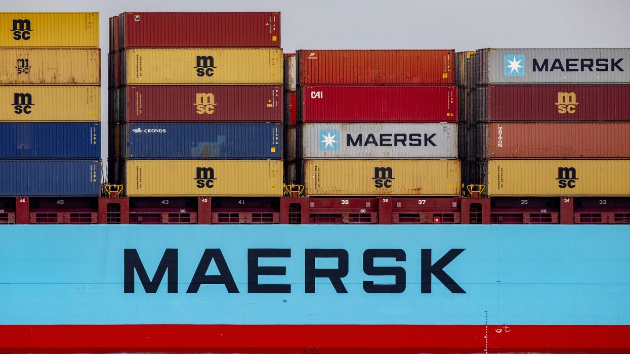 A Maersk vessel with shipping containers.