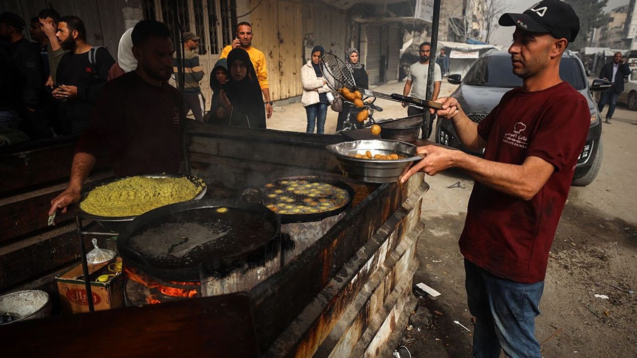 A man fries falafel in Gaza.