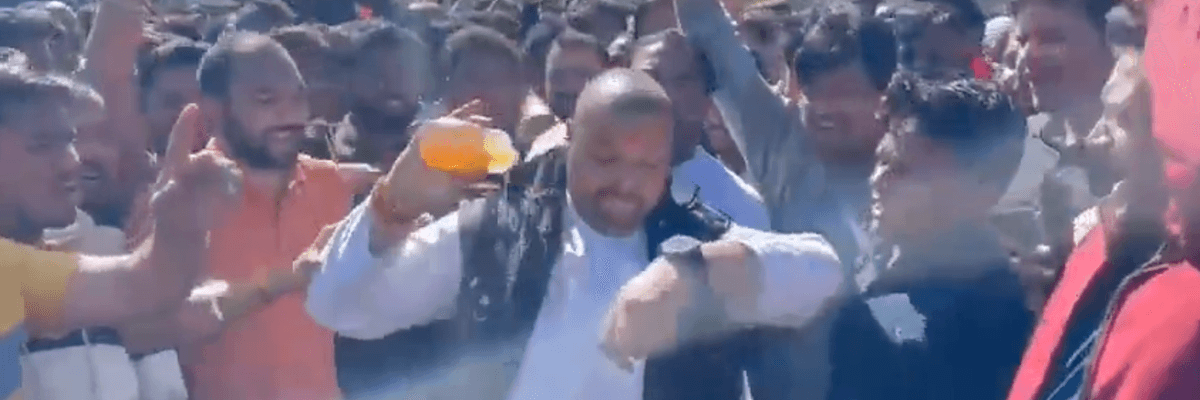 A man pours liquid on himself before being set on fire in an apparent self-immolation protest