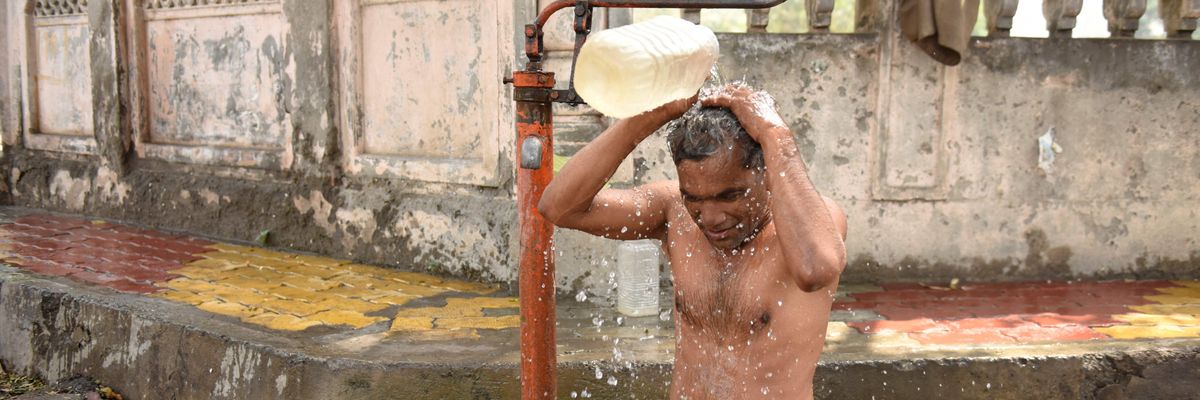 A man tries to cool off during a heatwave in Amritsar, India on April 30, 2022.