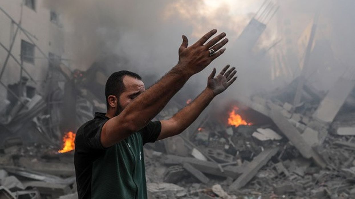 A man wails after Israeli airstrikes in Gaza City, Gaza