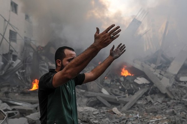 A man wails after Israeli airstrikes in Gaza City, Gaza