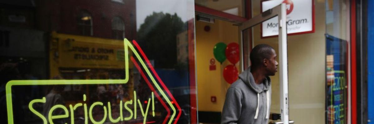 A man walks out of a payday loan store. 