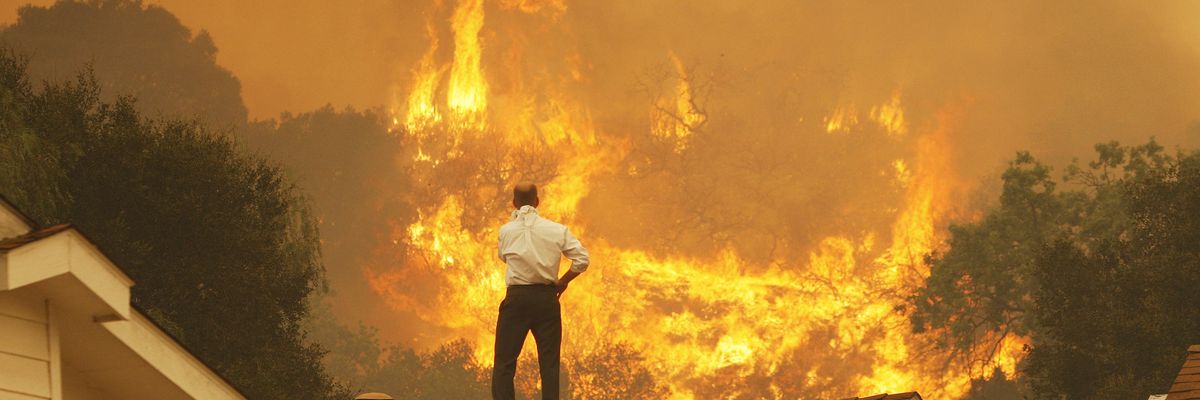 A man watched a wildfire