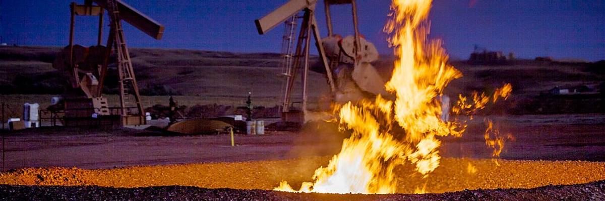 A methane flaring pit is seen in the Bakken Oil Field on October 18, 2011.