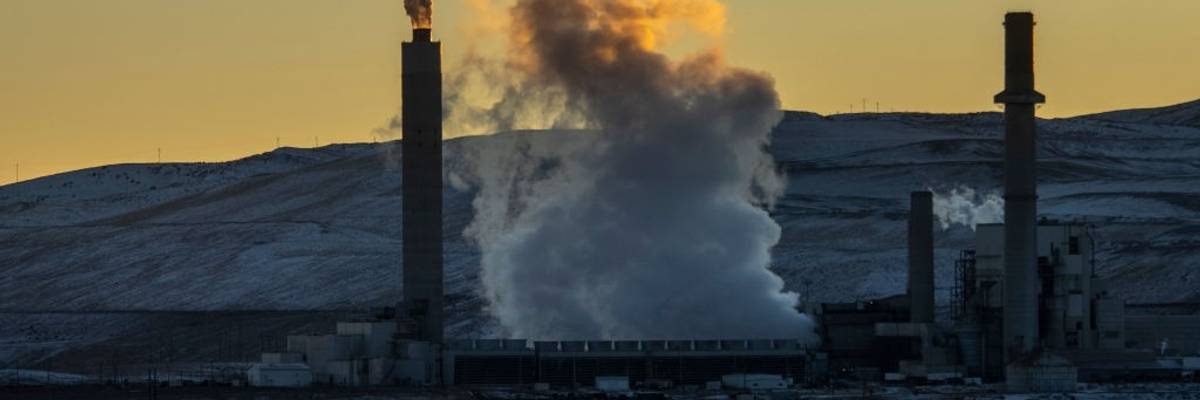 A mixture of steam and pollutants are emitted from the Naughton coal-fired power plant