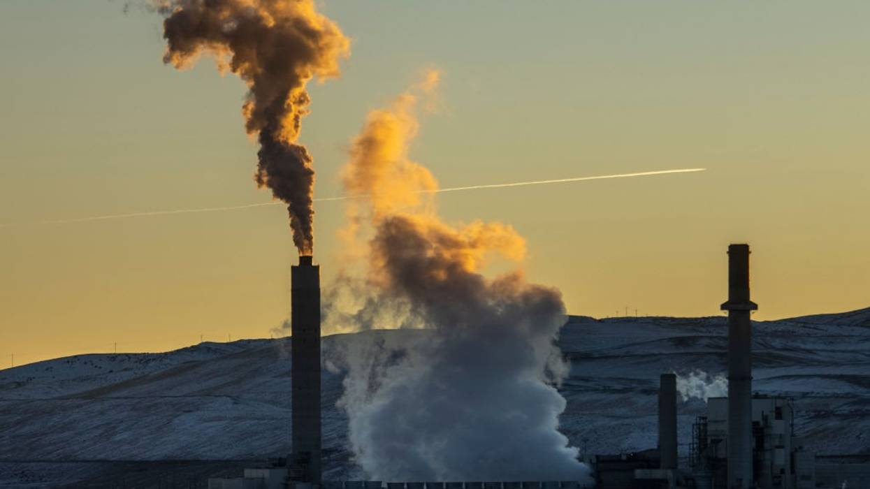 A mixture of steam and pollutants are emitted from the Naughton coal-fired power plant