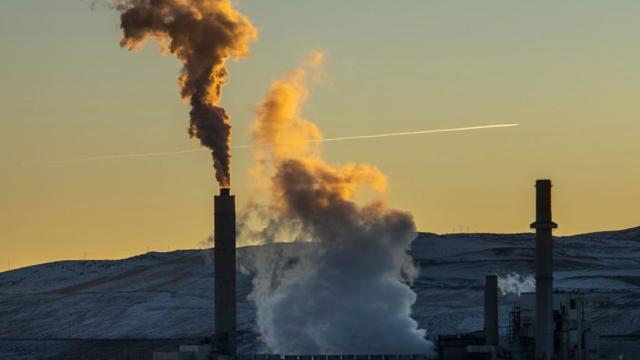 A mixture of steam and pollutants are emitted from the Naughton coal-fired power plant