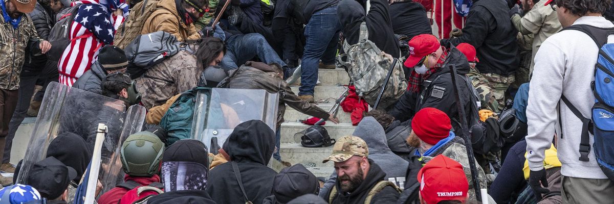 A mob of Trump supporters broke windows and breached the Capitol building in an attempt to overthrow the results of the 2020 election on January 6, 2021.