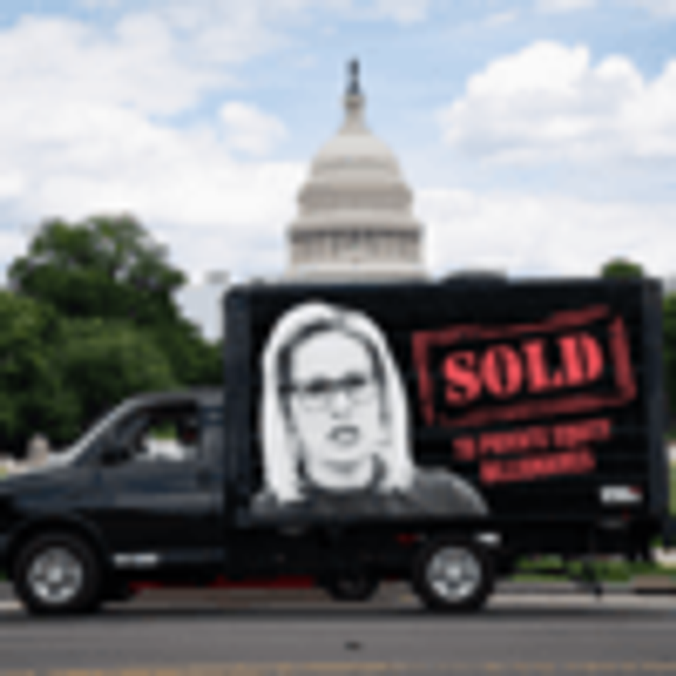 A mobile billboard criticizing Sen. Kyrsten Sinema (D-Ariz.) is seen in Washington, D.C. on August 8, 2022.