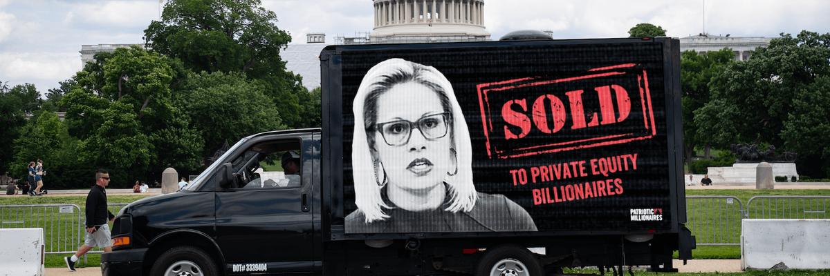 A mobile billboard criticizing Sen. Kyrsten Sinema (D-Ariz.) is seen in Washington, D.C. on August 8, 2022.